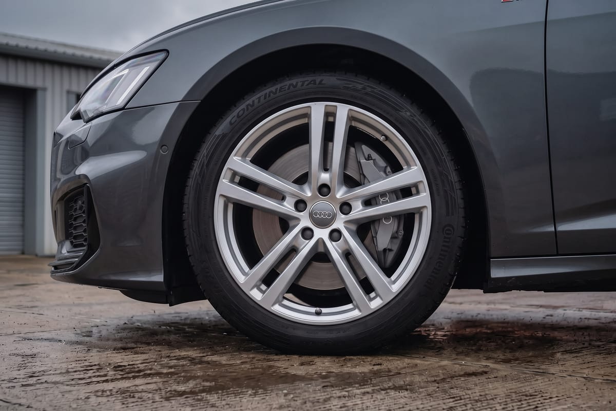 Audi A6 Avant 40 TDI S line S tronic alloy wheel and brake detail