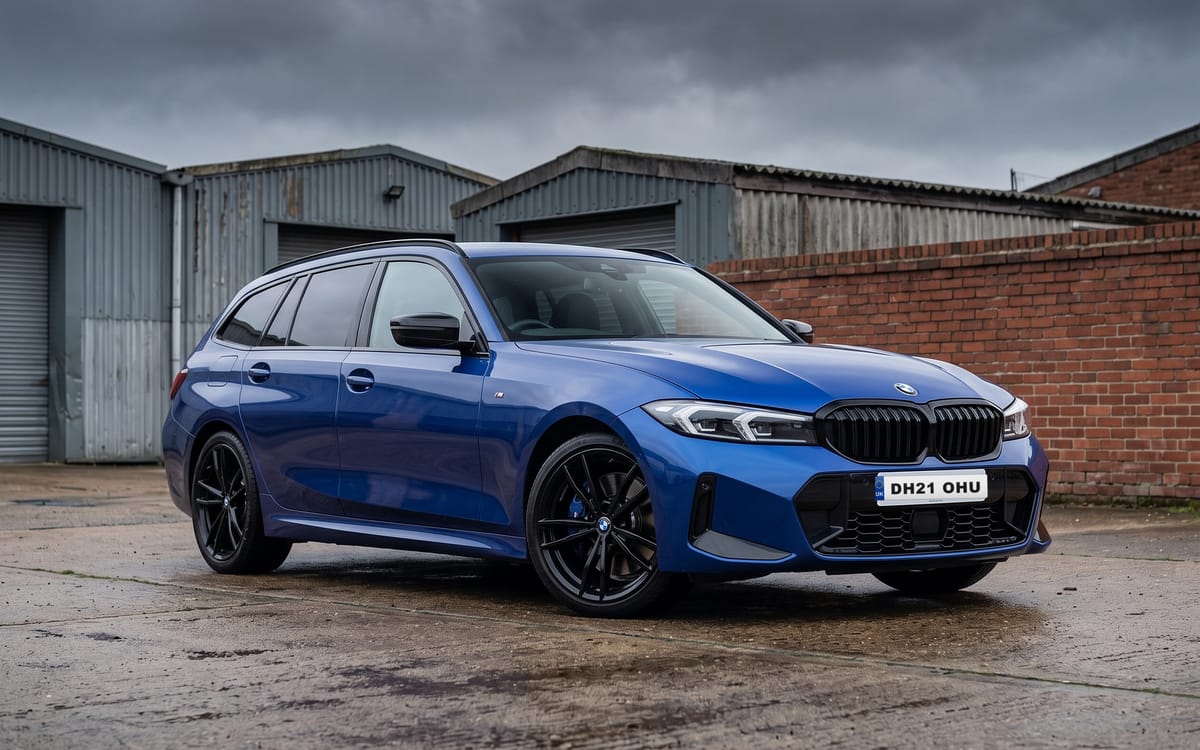 BMW M340i xDrive Touring in Portimao Blue Metallic, front three-quarter view