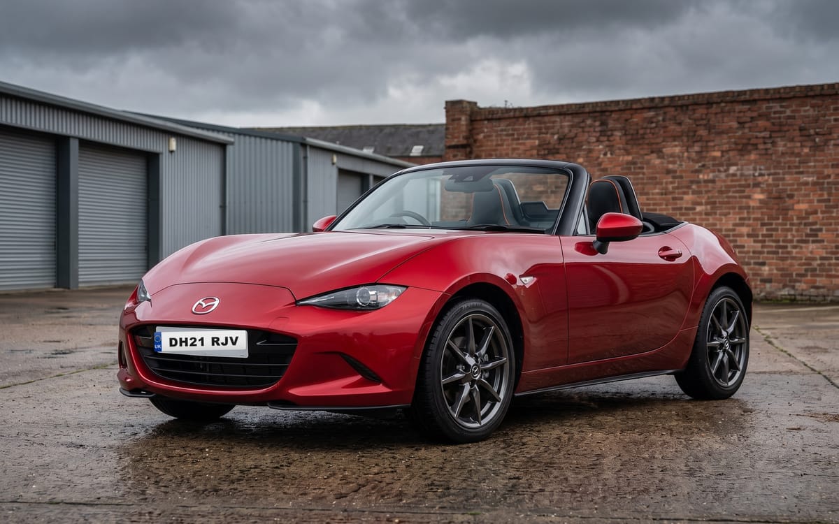 Mazda MX-5 2.0 GT Sport Tech in Soul Red Crystal Metallic, front three-quarter view