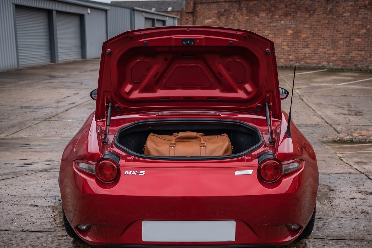 Mazda MX-5 2.0 GT Sport Tech rear luggage compartment with the boot lid raised